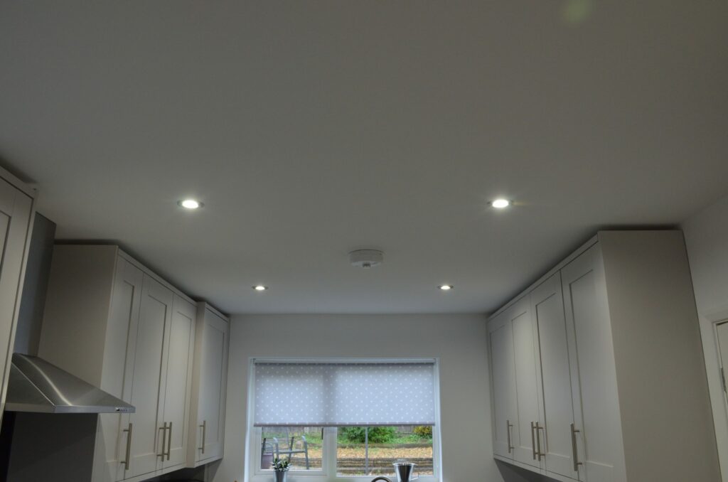 Paint sprayed kitchen ceiling and walls Avanti Decorate