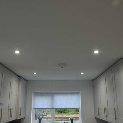 Paint sprayed kitchen ceiling and walls