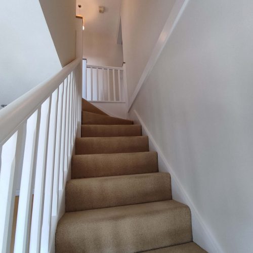 Hall and stairs in Farrow and Ball