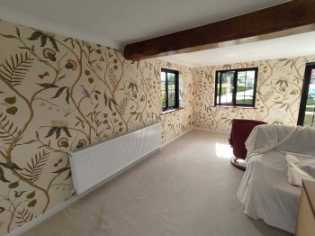 Lewis and wood feature wall lounge