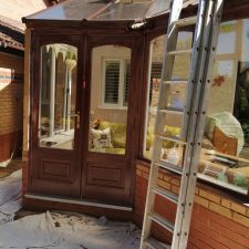 Exterior conservatory replacing rotting timber