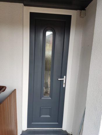 Exterior sprayed UPVC back door after