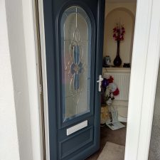 Exterior sprayed UPVC front door after side view