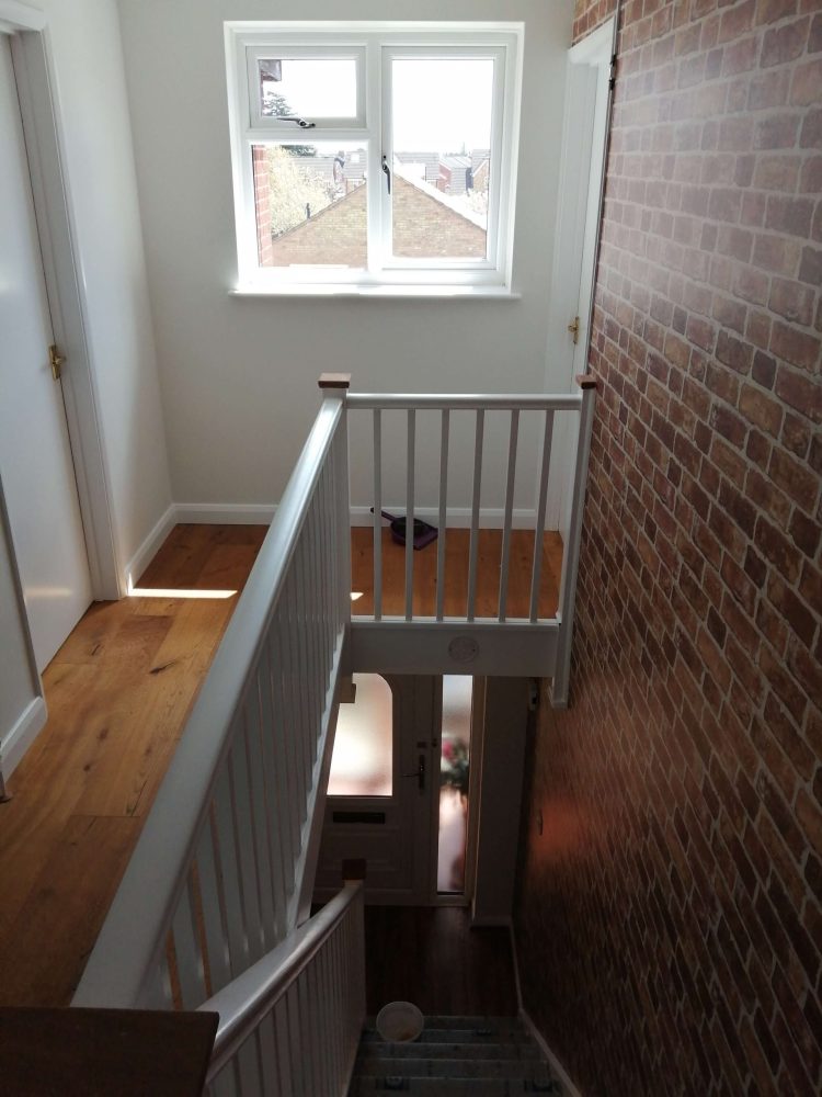 Brick feature wall stairs